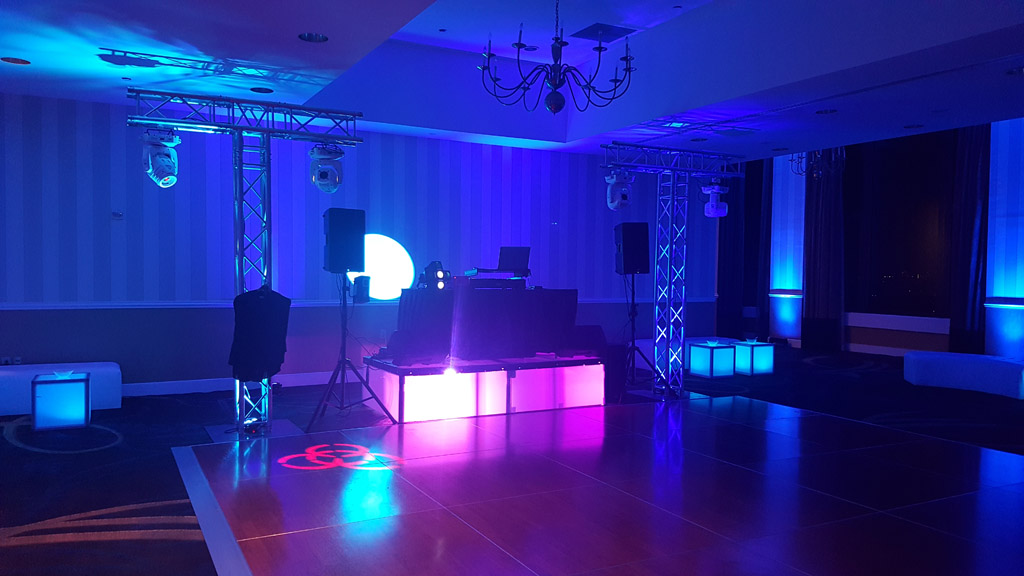 Professional LED DJ setup with truss lighting